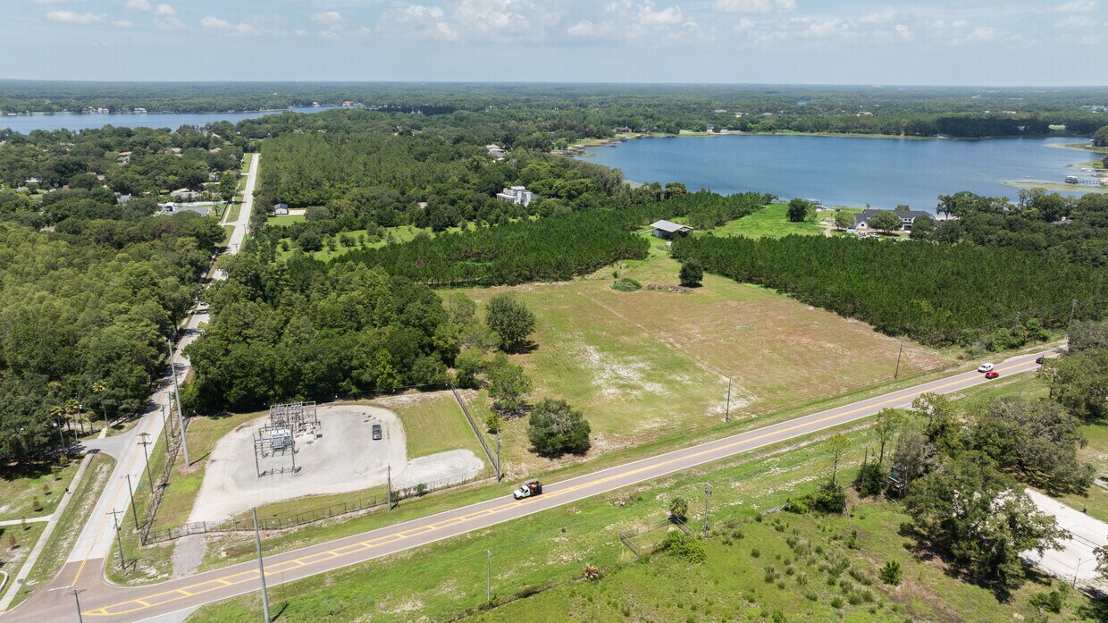 Extensive Frontage on Wayne Road Aerial view with a clear depiction of the property's significant road frontage along Wayne Road, with Keystone Lake in the background.