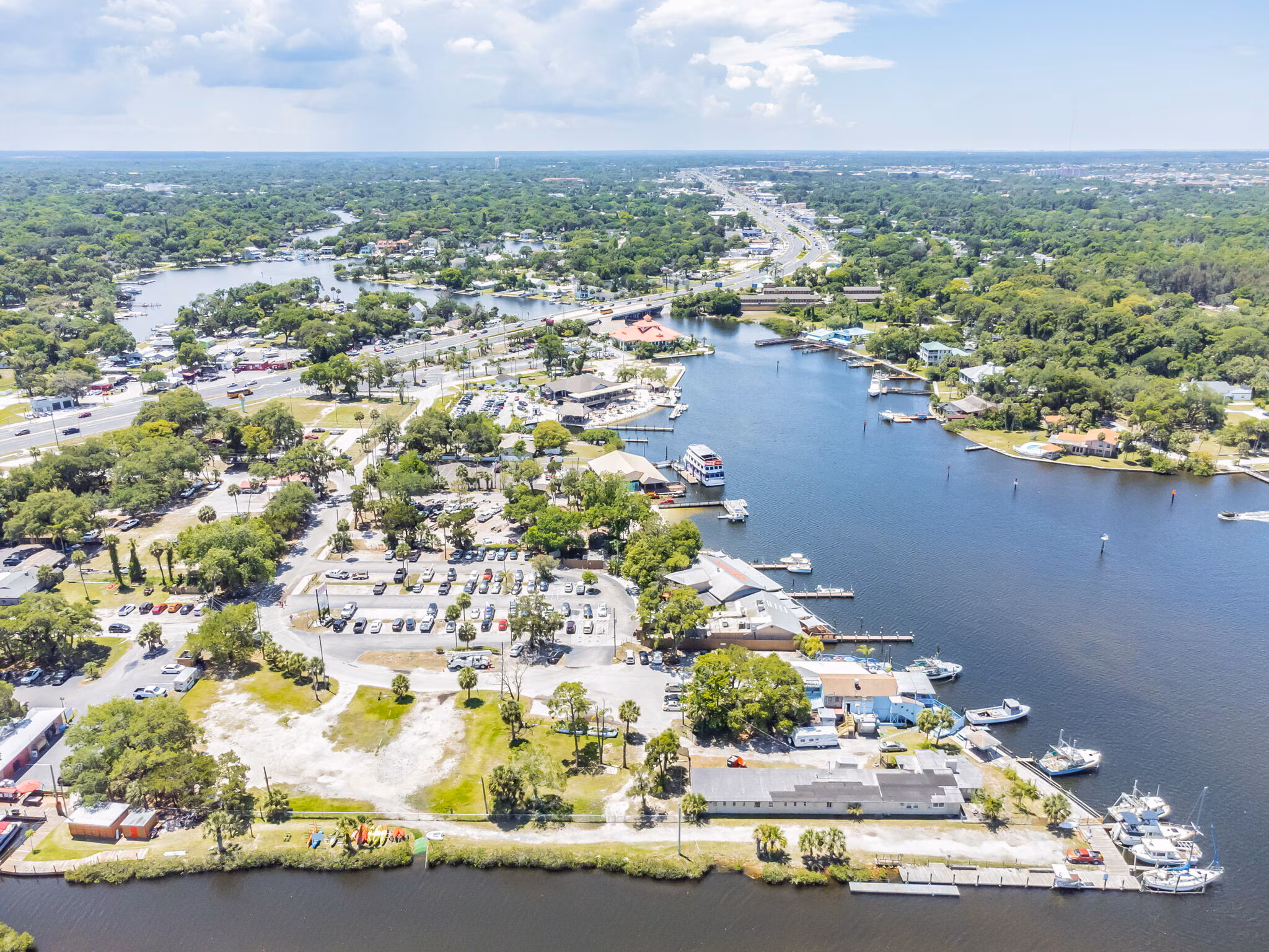 An aerial view showing the restaurant's location in the Tampa MSA, its proximity to major roads, and the surrounding commercial and residential areas.