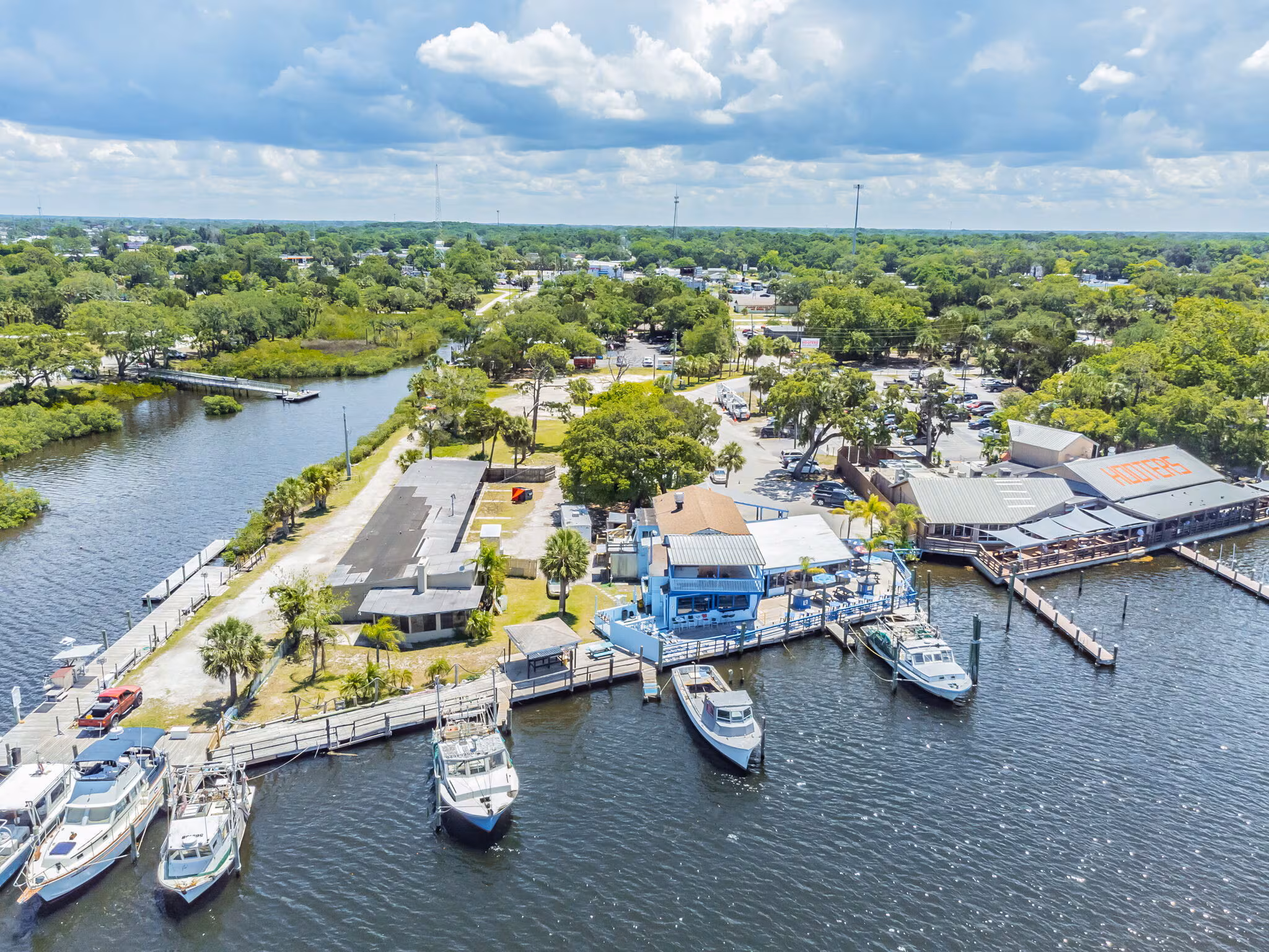 A view of the 1.24-acre waterfront property for sale, highlighting the C2/Resort zoning which allows for hotel, marina, or mixed-use development in the Tampa MSA.